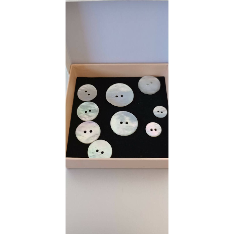 9 Mother of Pearl Buttons, various sizes