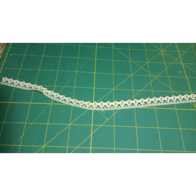 Cream colored 1/2" flat lace, 12 ft length