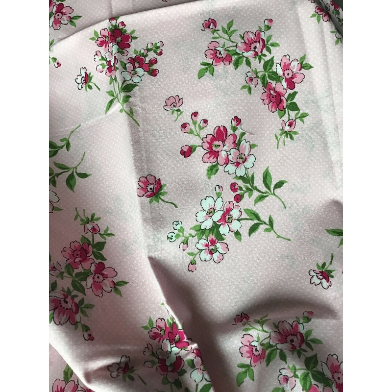 Pink floral on pink cotton fabric