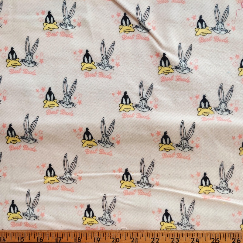 Camelot Fabrics Flannel Best Friends Daffy Duck and Bugs Bunny Pink
