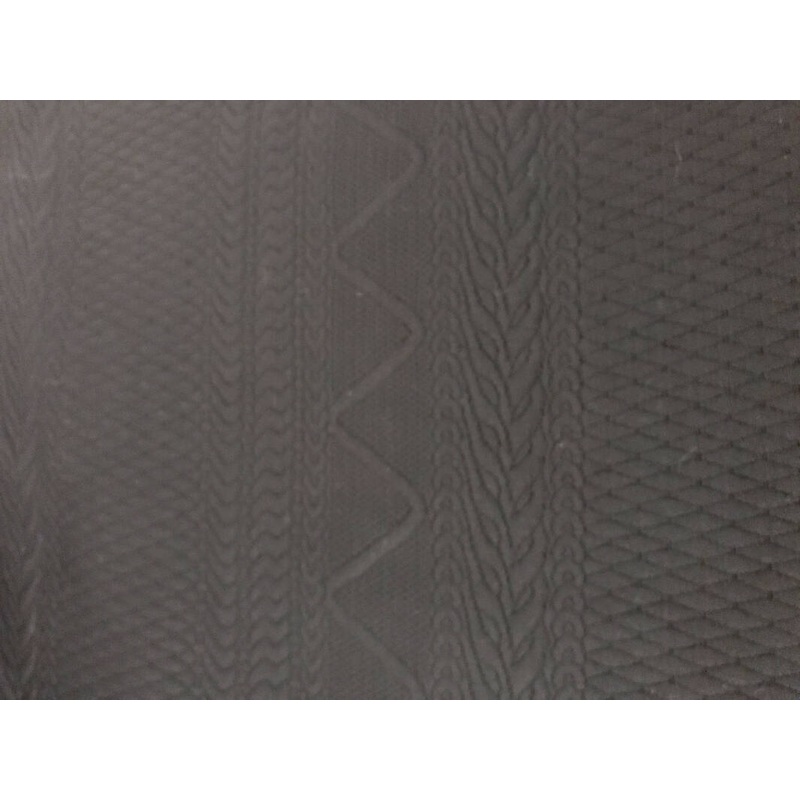 1.5 yards Seattle knit - Black stretchy fabric with sweater design